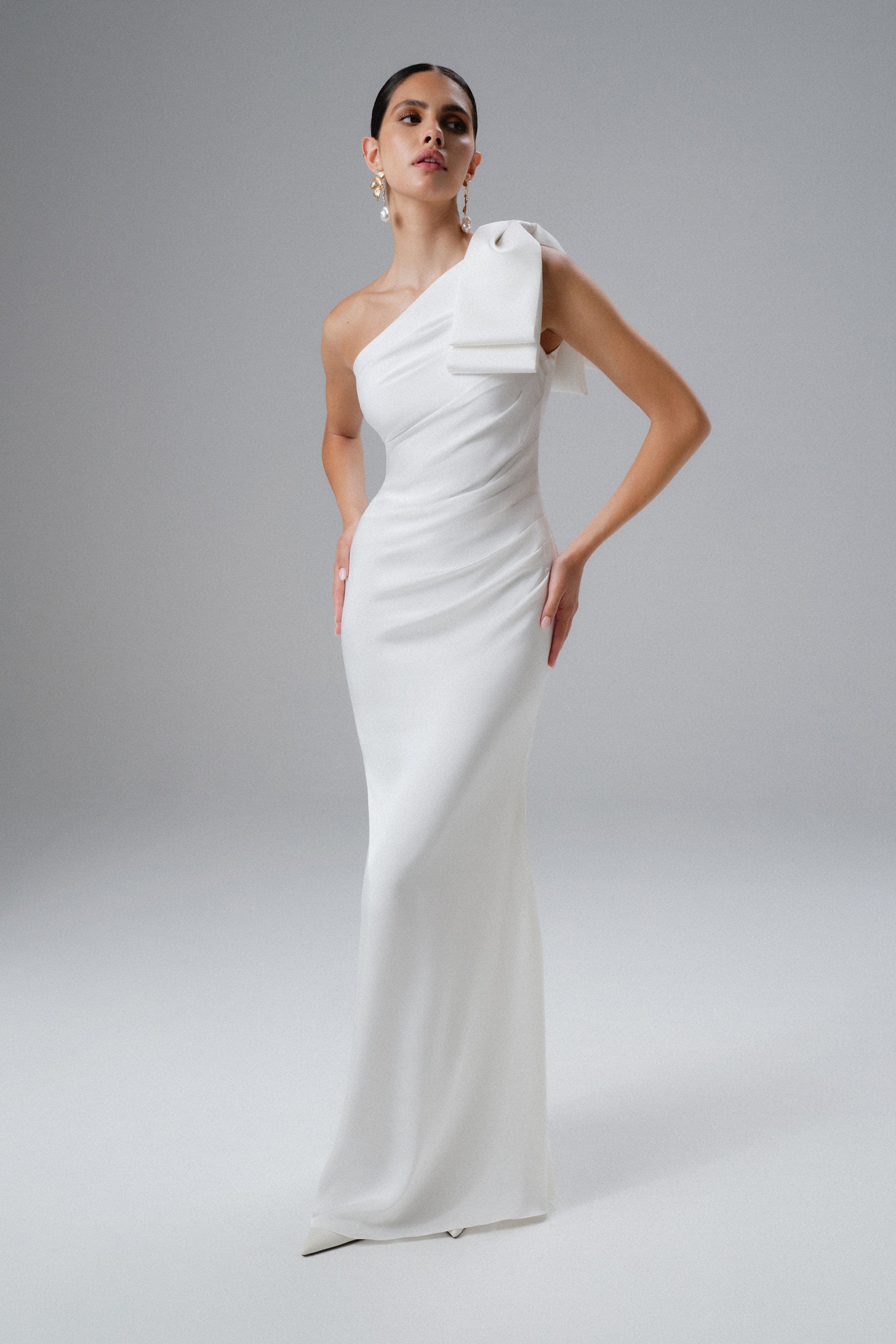 EMELIA One Shoulder Bow Pleated Maxi Dress in White
